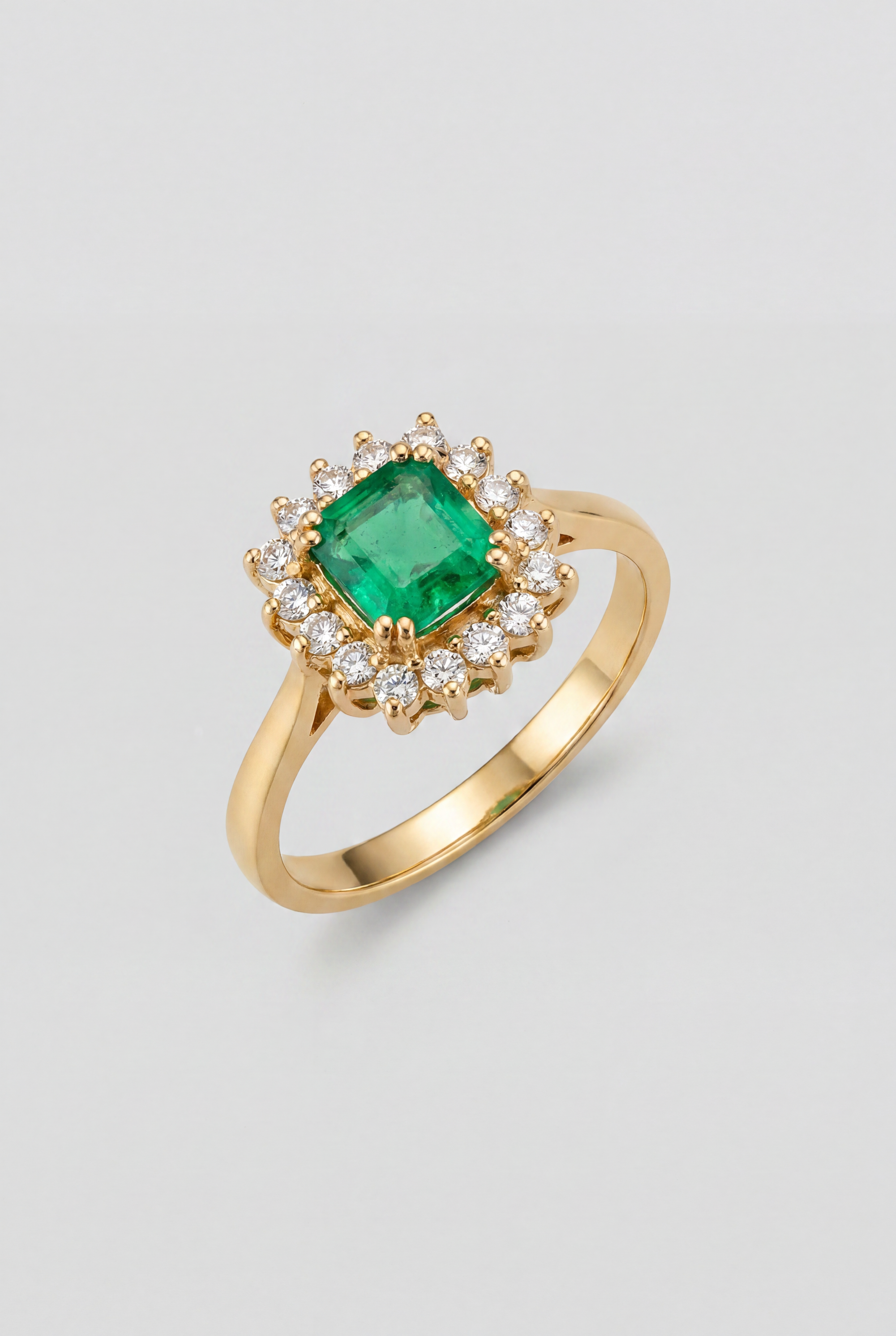 Anillo de diamantes, esmeralda y oro amarillo Corona Halo Adomello