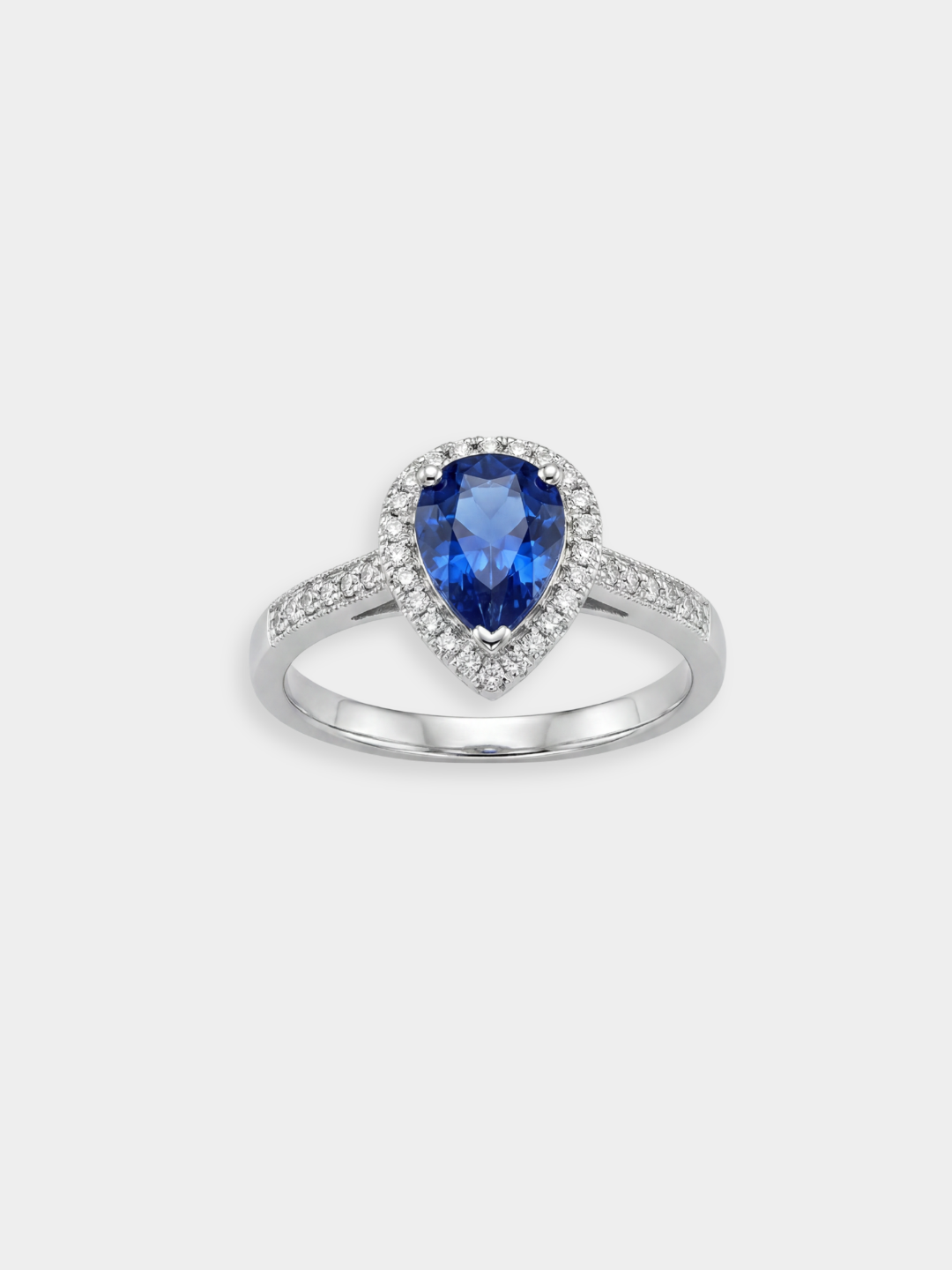 Anillo Halo Pavé de Oro Blanco con Zafiro Azul y Diamantes | Amiata