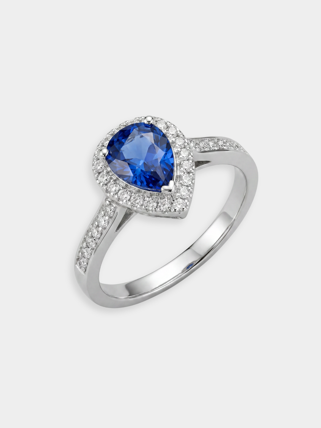 Anillo Halo Pavé de Oro Blanco con Zafiro Azul y Diamantes | Amiata